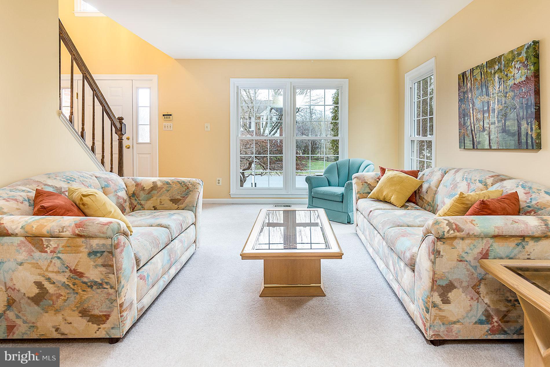 6453 Springhouse Circle Clifton, VA 20124 - Photo 4 of 30 a living room with furniture and a large window