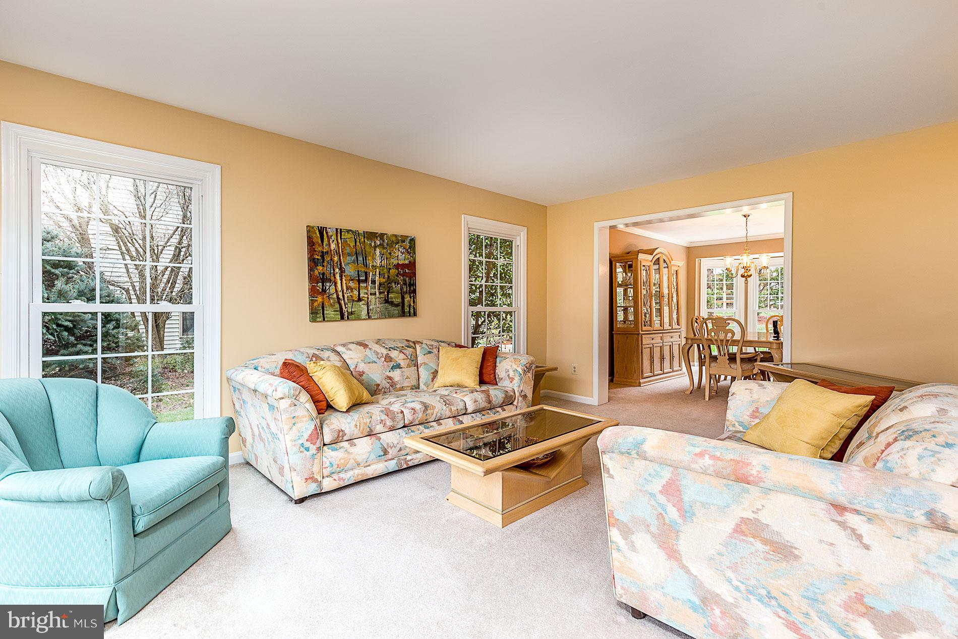 6453 Springhouse Circle Clifton, VA 20124 - Photo 5 of 30 a living room with furniture and a large window