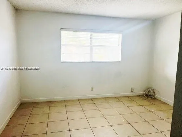 a view of a room with a window