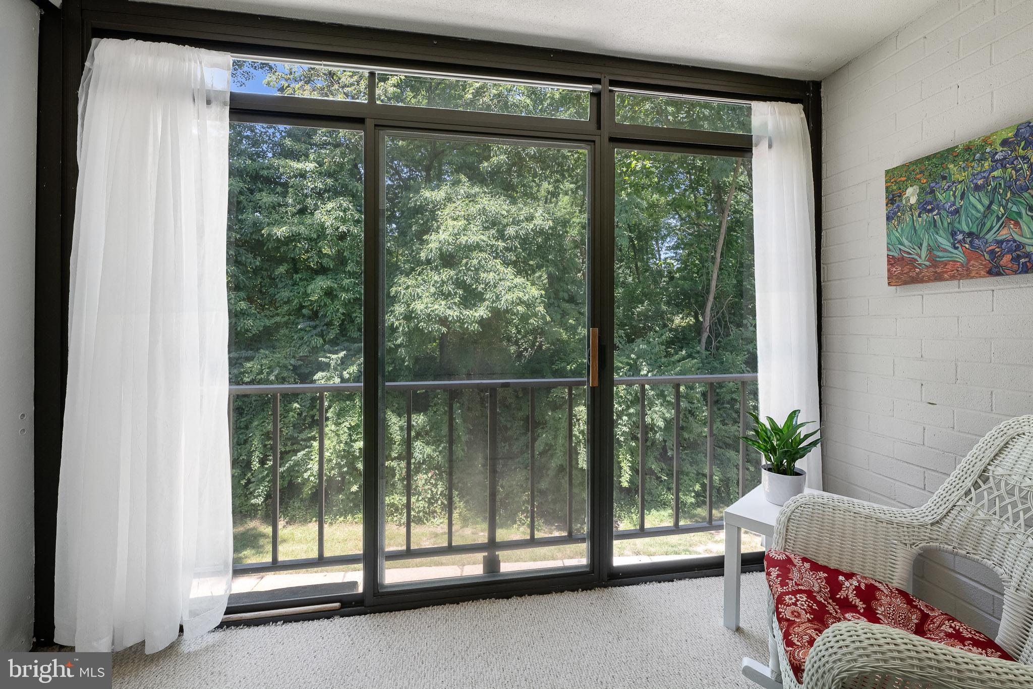 80 Welsh Tract Road, Unit 205 Newark, DE 19713 - Photo 11 of 23 View of trees oin enclosed porch