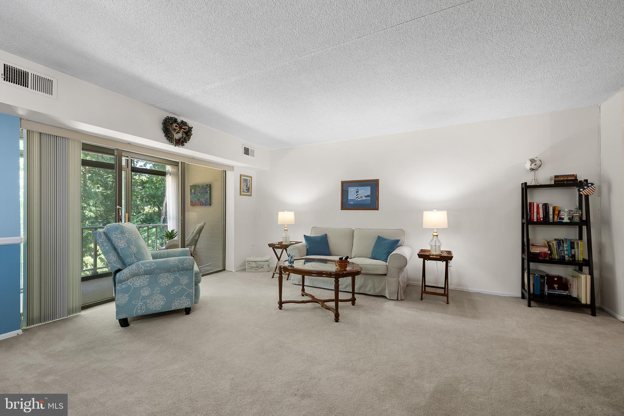 80 Welsh Tract Road, Unit 205 Newark, DE 19713 - Photo 3 of 23 Living room view from dining room