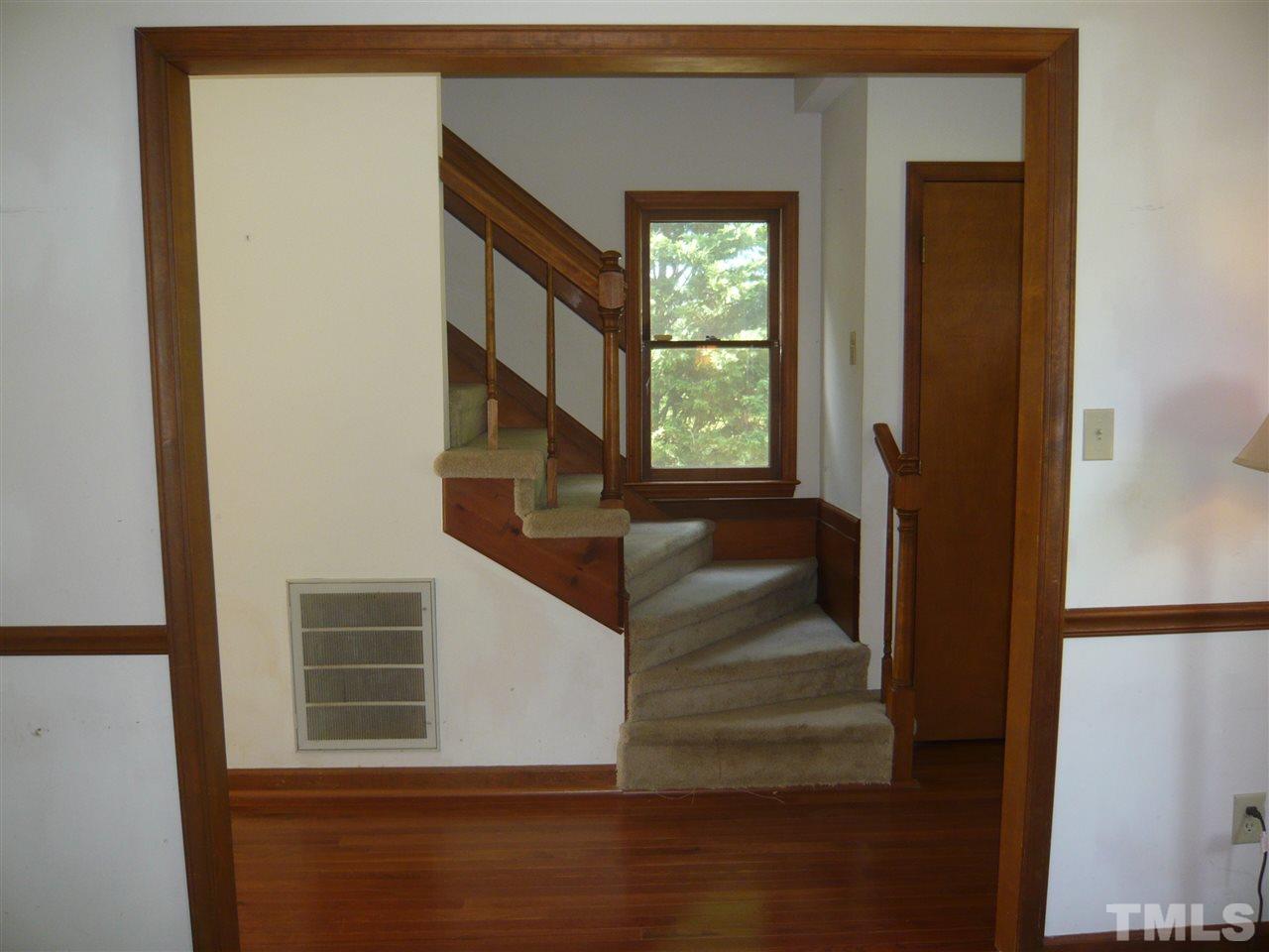 7301 Buck Road Wendell, NC 27591 - Photo 18 of 25 a view of entryway and hall with wooden floor