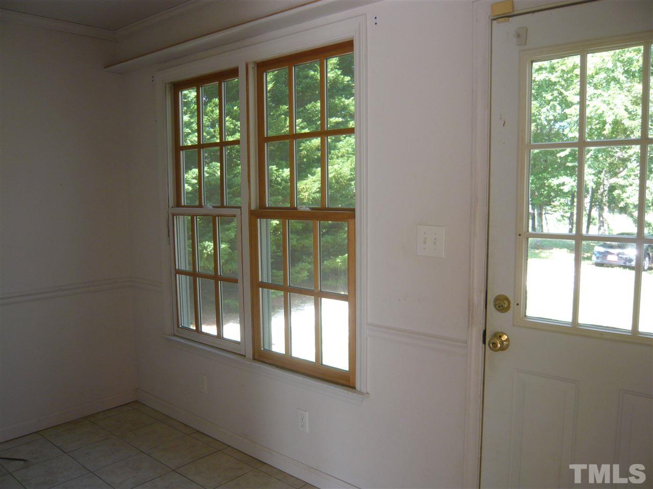 7301 Buck Road Wendell, NC 27591 - Photo 8 of 25 a view of an empty room and window