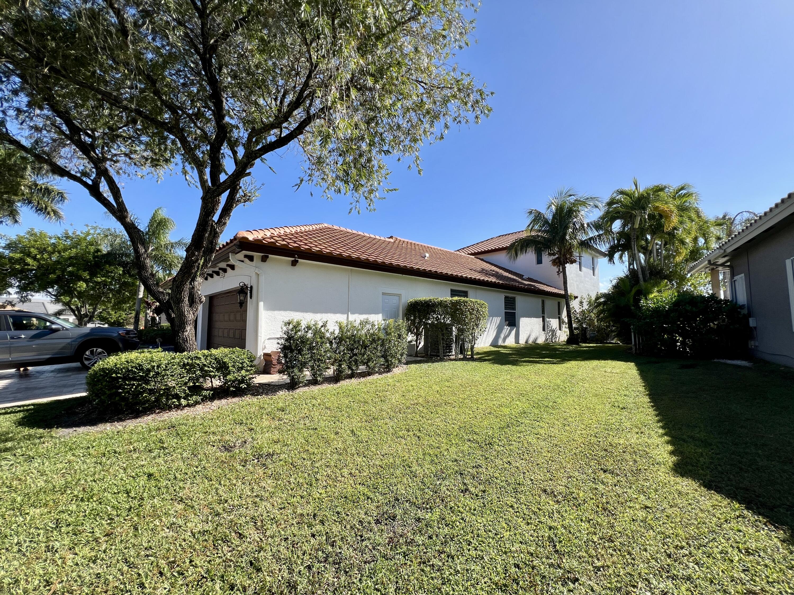 12211 Rockledge Circle Boca Raton, FL 33428 - Photo 3 of 78 Right side of home