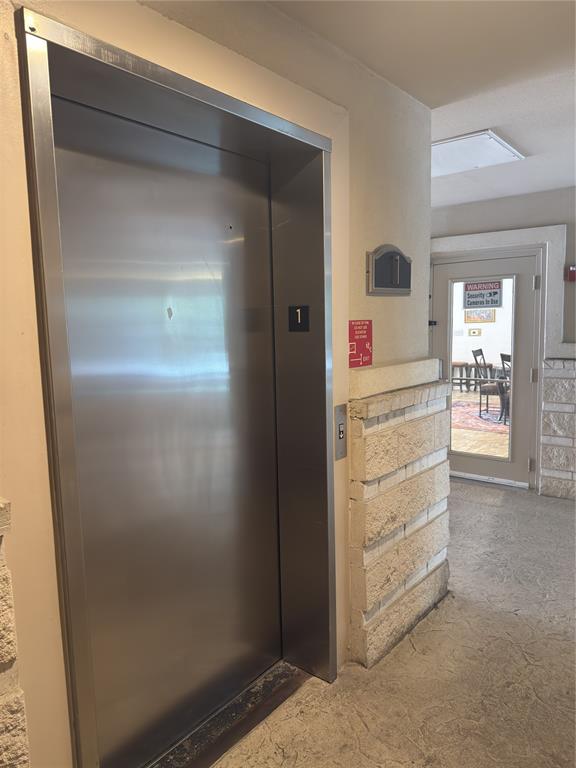 3102 Kings Road, Unit 1106 Dallas, TX 75219 - Photo 20 of 20 hallway with mirror