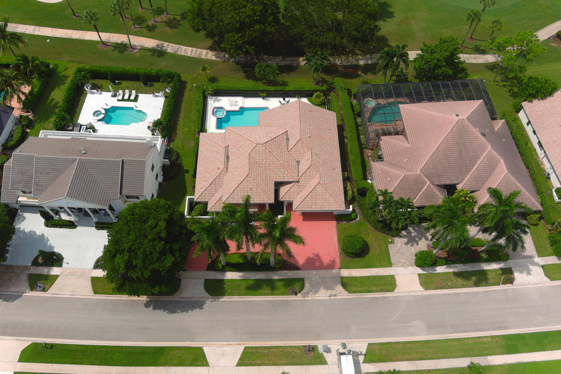 10403 Stonebridge Boulevard Boca Raton, FL 33498 - Photo 29 of 51 an aerial view of a house with a garden and plants