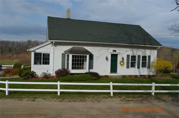 181 Butler Road Monson, MA 01057 - Photo 1 of 24 a front view of a house with a yard