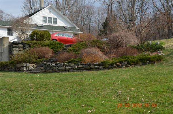 181 Butler Road Monson, MA 01057 - Photo 6 of 24 a front view of house with yard and trees