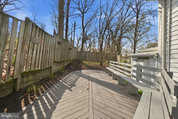 a view of a chairs and table in the garden