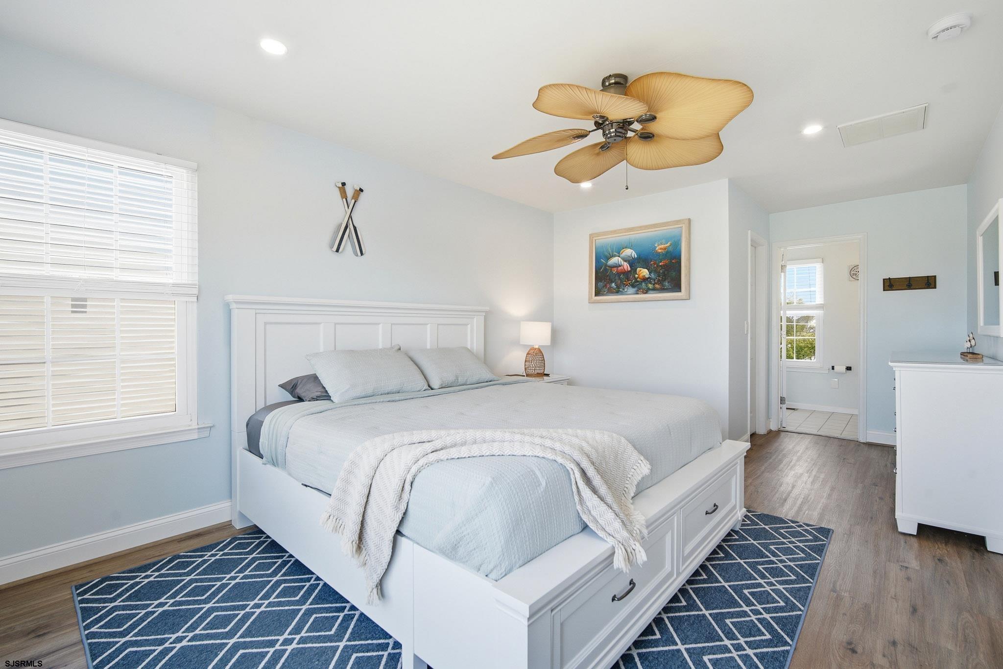 214 Hagen Road Brigantine, NJ 08203 - Photo 26 of 34 a bedroom with a bed and a window