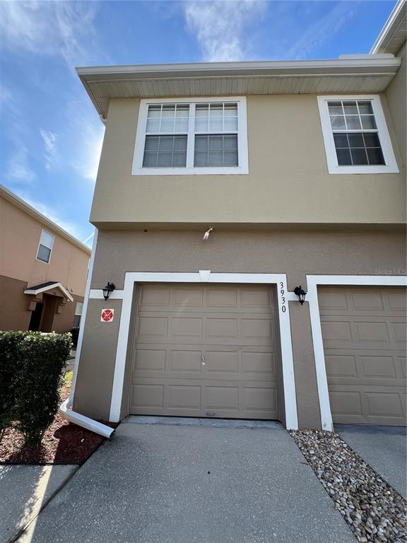 3930 Pemberly Pines Circle St. Cloud, FL 34769 - Photo 1 of 1 a front view of a house