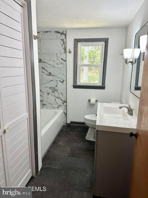 135 South Main Street Barnegat, NJ 08005 - Photo 13 of 35 a bathroom with a sink a toilet and shower