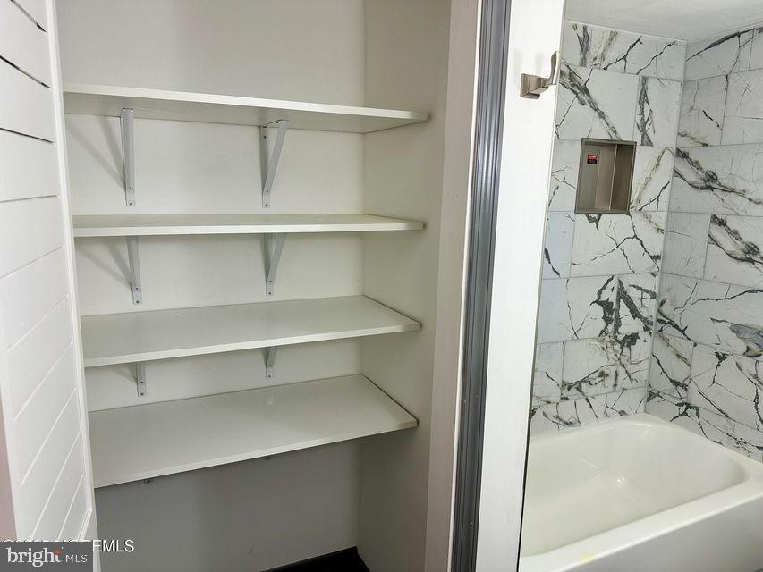 135 South Main Street Barnegat, NJ 08005 - Photo 15 of 35 a bathroom with a bathtub