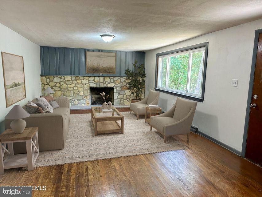 135 South Main Street Barnegat, NJ 08005 - Photo 24 of 35 a living room with furniture and a fireplace