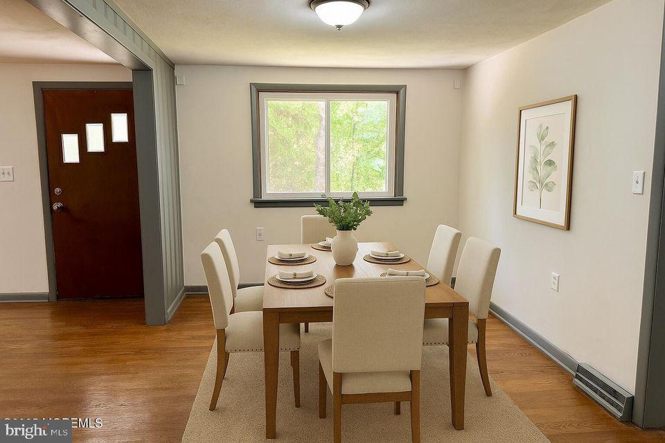 135 South Main Street Barnegat, NJ 08005 - Photo 25 of 35 a view of a dining room with furniture and wooden floor