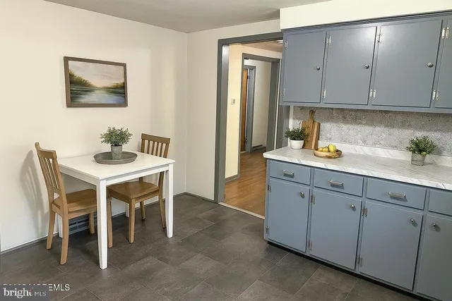 a bedroom with a bed and a desk