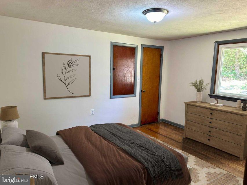 135 South Main Street Barnegat, NJ 08005 - Photo 29 of 35 a bedroom with a bed and a window