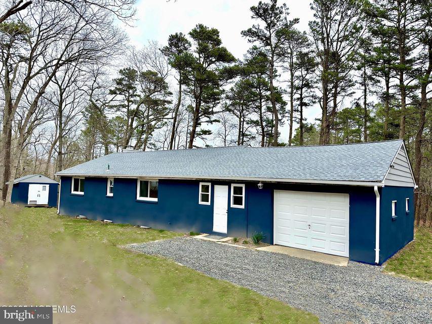 135 South Main Street Barnegat, NJ 08005 - Photo 31 of 35 a front view of a house with garden