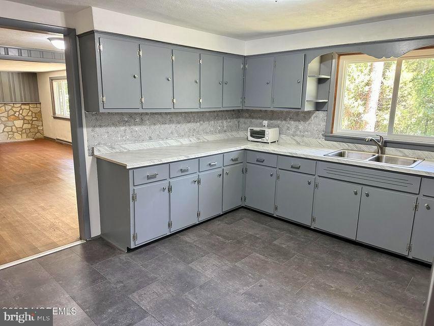 135 South Main Street Barnegat, NJ 08005 - Photo 7 of 35 a kitchen with a sink and cabinets