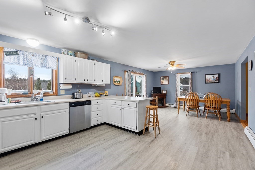 164 Sterling Road Princeton, MA 01541 - Photo 13 of 36 a large kitchen with a large window and stainless steel appliances