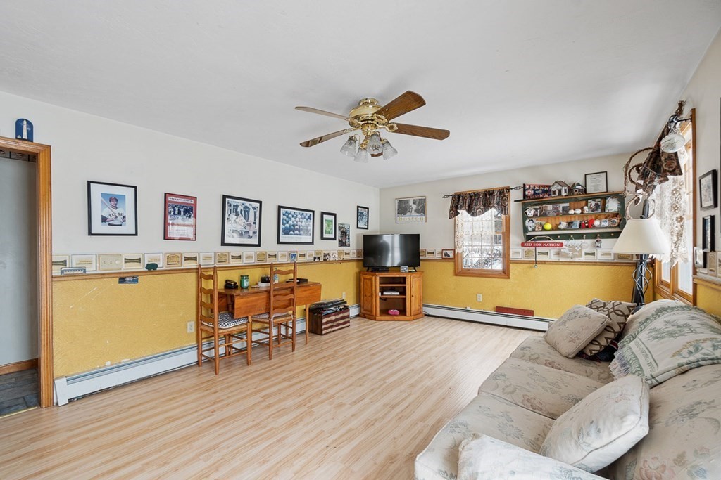 164 Sterling Road Princeton, MA 01541 - Photo 14 of 36 a living room with furniture and wooden floor