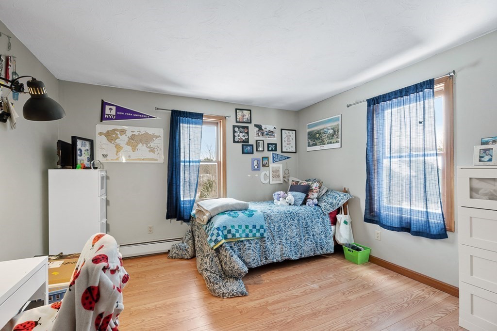 164 Sterling Road Princeton, MA 01541 - Photo 22 of 36 a living room with a bed furniture and a window