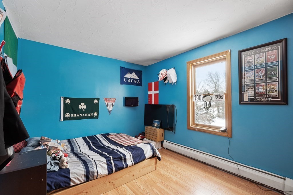 164 Sterling Road Princeton, MA 01541 - Photo 24 of 36 a bedroom with bed and a window