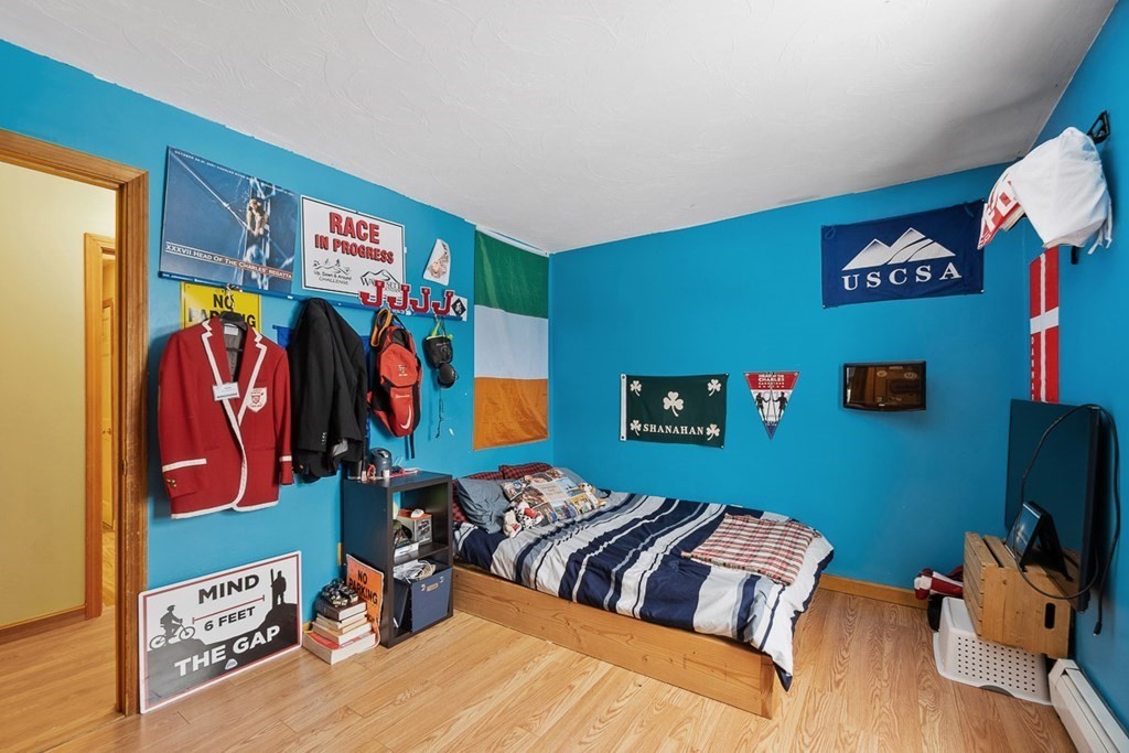164 Sterling Road Princeton, MA 01541 - Photo 25 of 36 a bedroom with a bed and a bookshelf