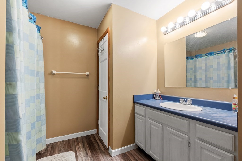 164 Sterling Road Princeton, MA 01541 - Photo 26 of 36 a bathroom with a sink and a mirror
