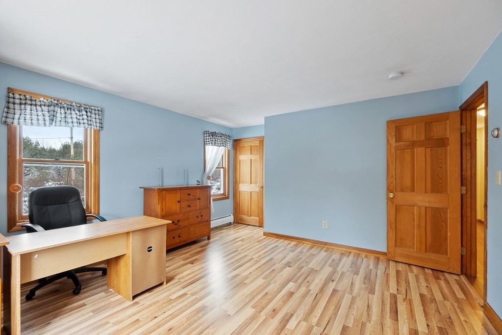 164 Sterling Road Princeton, MA 01541 - Photo 30 of 36 a living room with furniture and a window