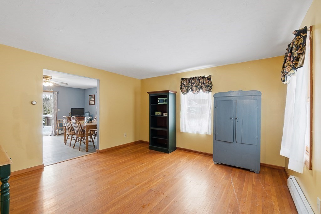 164 Sterling Road Princeton, MA 01541 - Photo 4 of 36 a view of a livingroom with furniture and wooden floor