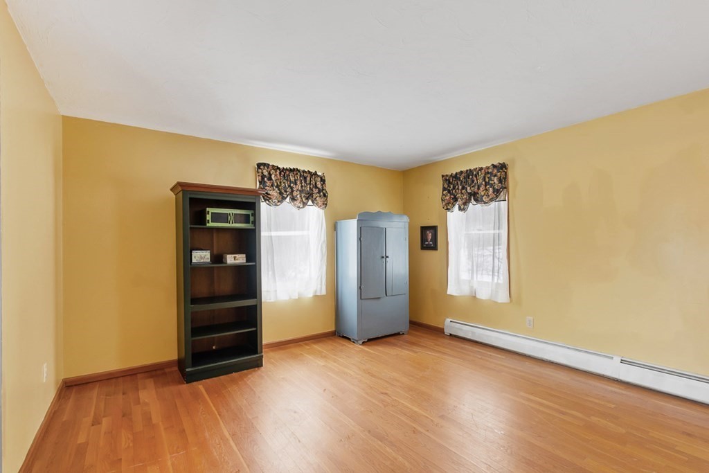 164 Sterling Road Princeton, MA 01541 - Photo 6 of 36 an empty room with closet and windows