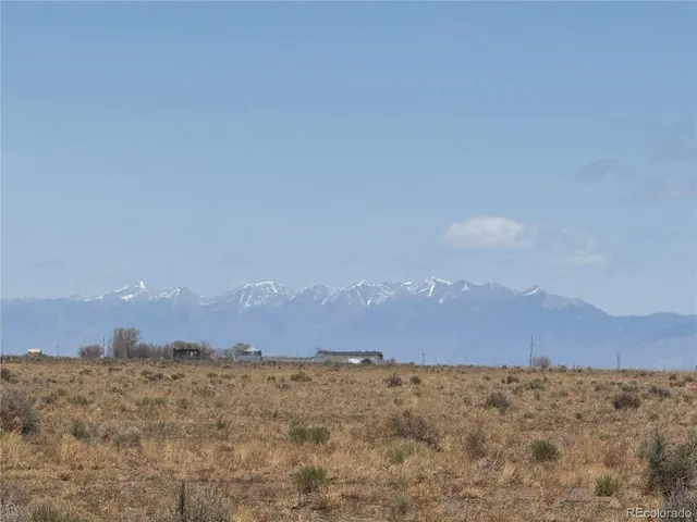 a view of outside with green space