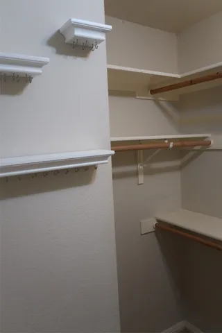 a view of small space with racks on the wall