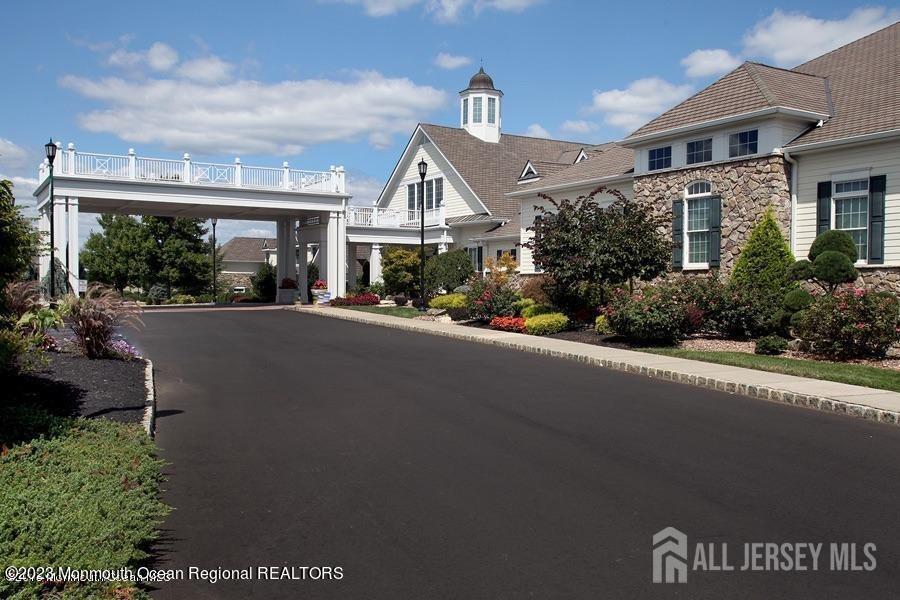 47 Kings Mill Road Monroe Township, NJ 08831 - Photo 27 of 38 a front view of a house with a garden and street view
