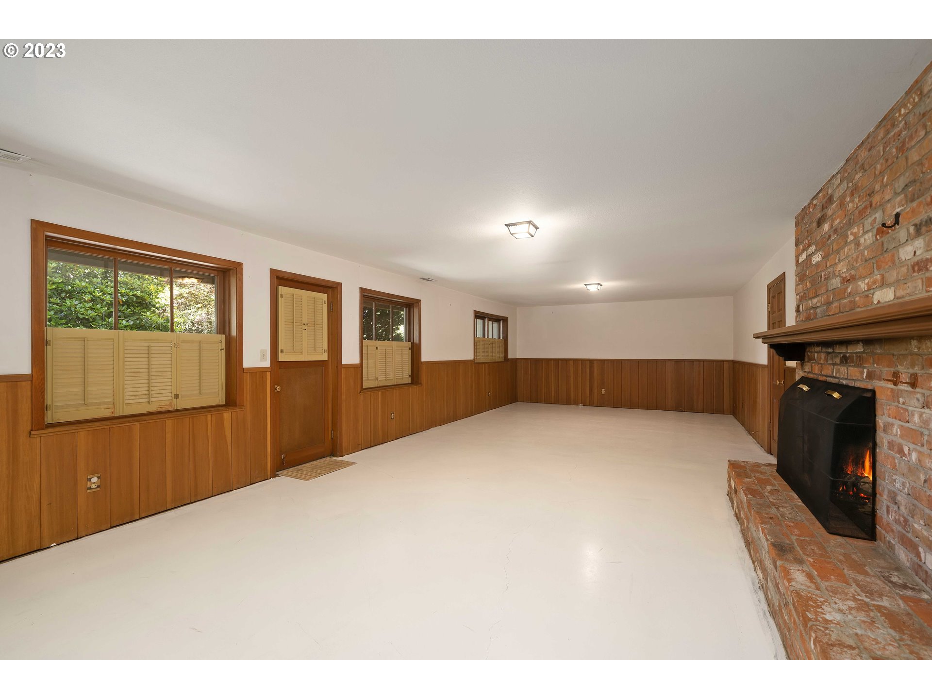 3815 Southwest 50th Avenue Portland, OR 97221 - Photo 18 of 36 a view of a kitchen with furniture and a window