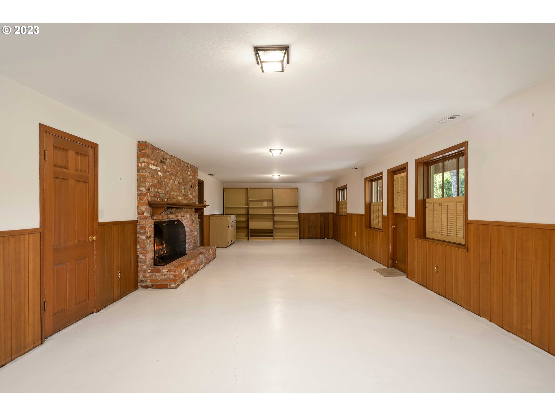 3815 Southwest 50th Avenue Portland, OR 97221 - Photo 19 of 36 a view of kitchen with furniture and fireplace