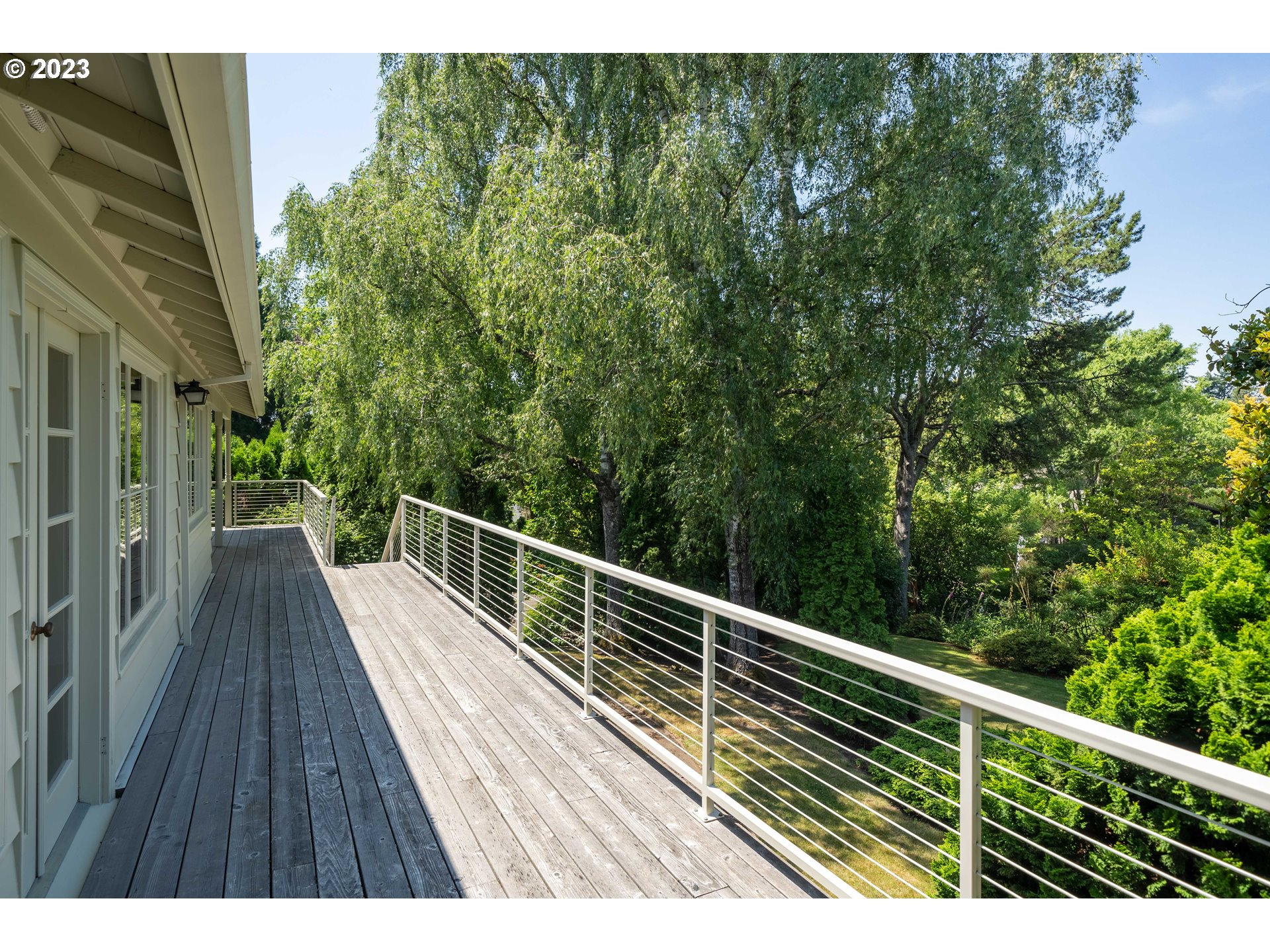 3815 Southwest 50th Avenue Portland, OR 97221 - Photo 25 of 36 a view of balcony with wooden floor and fence