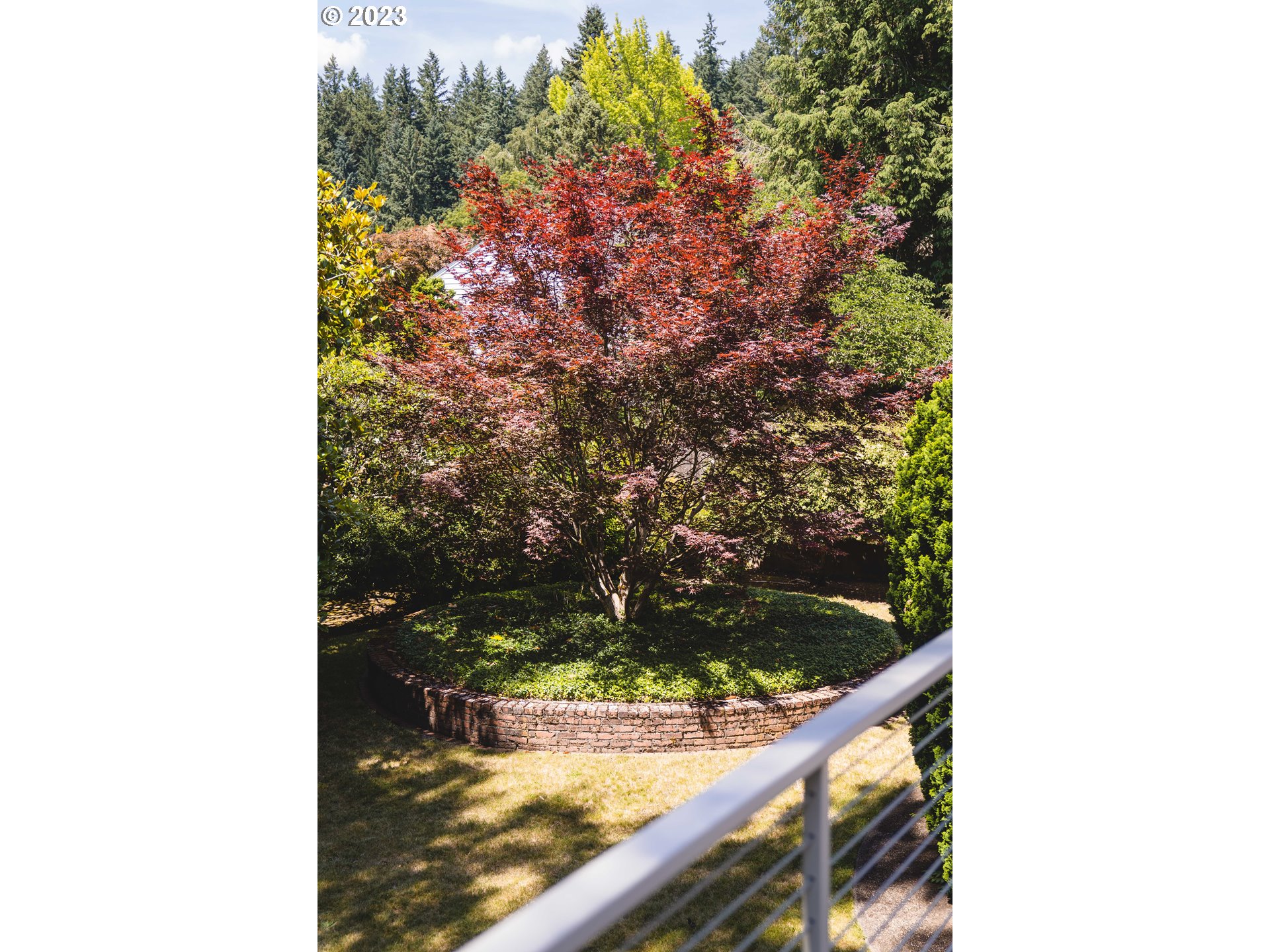 3815 Southwest 50th Avenue Portland, OR 97221 - Photo 27 of 36 a picture of a bench in a balcony
