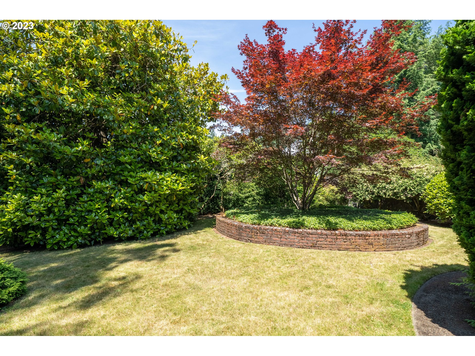 3815 Southwest 50th Avenue Portland, OR 97221 - Photo 30 of 36 a view of a garden
