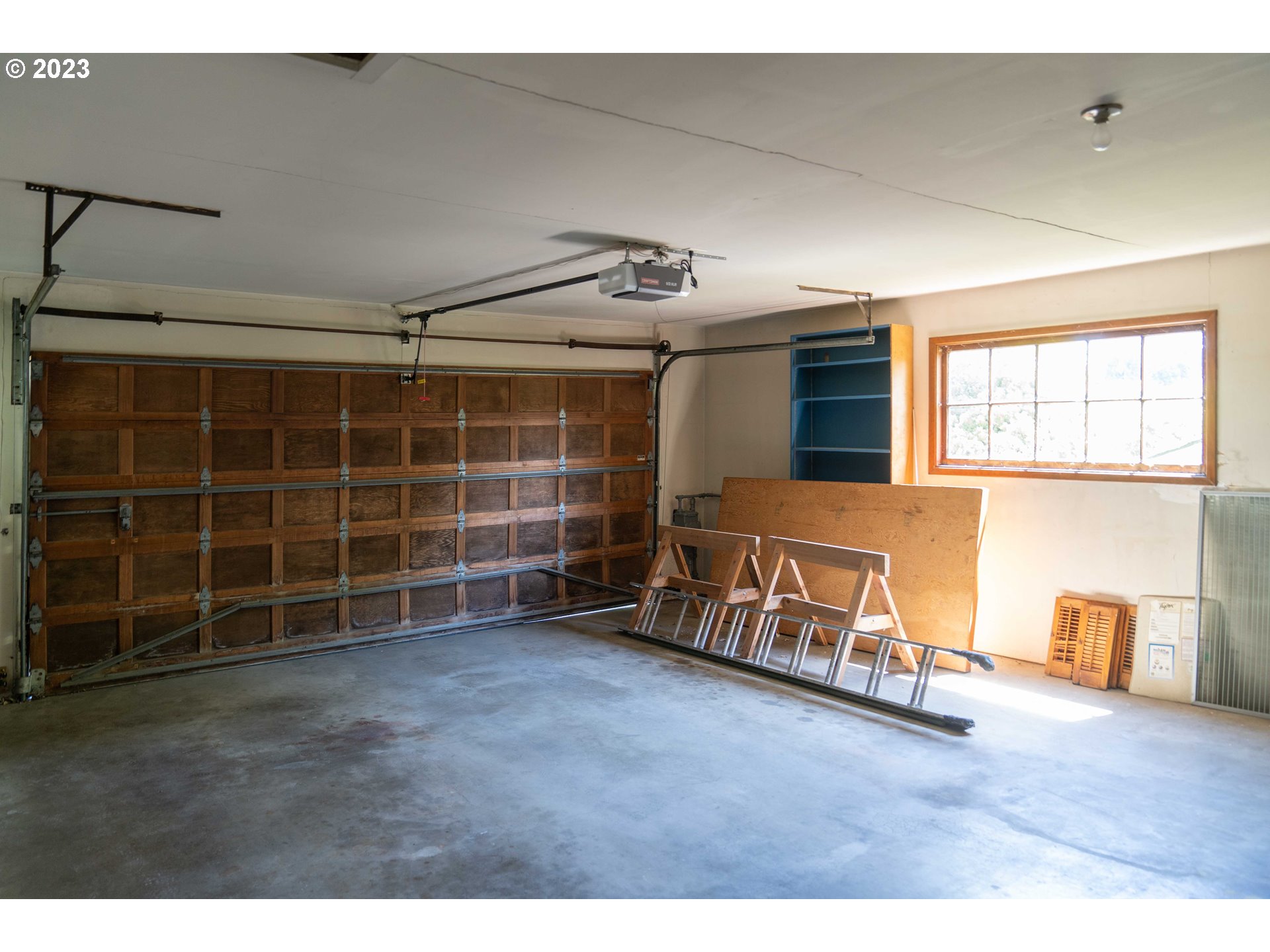 3815 Southwest 50th Avenue Portland, OR 97221 - Photo 32 of 36 a livingroom with furniture and a window
