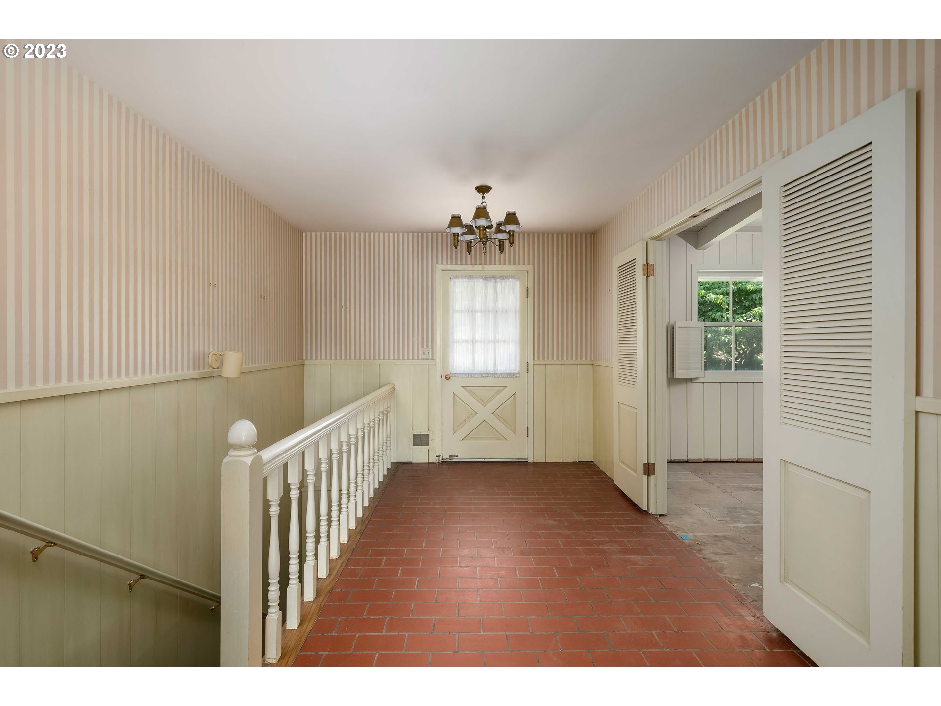 3815 Southwest 50th Avenue Portland, OR 97221 - Photo 4 of 36 a view of entryway with stairs