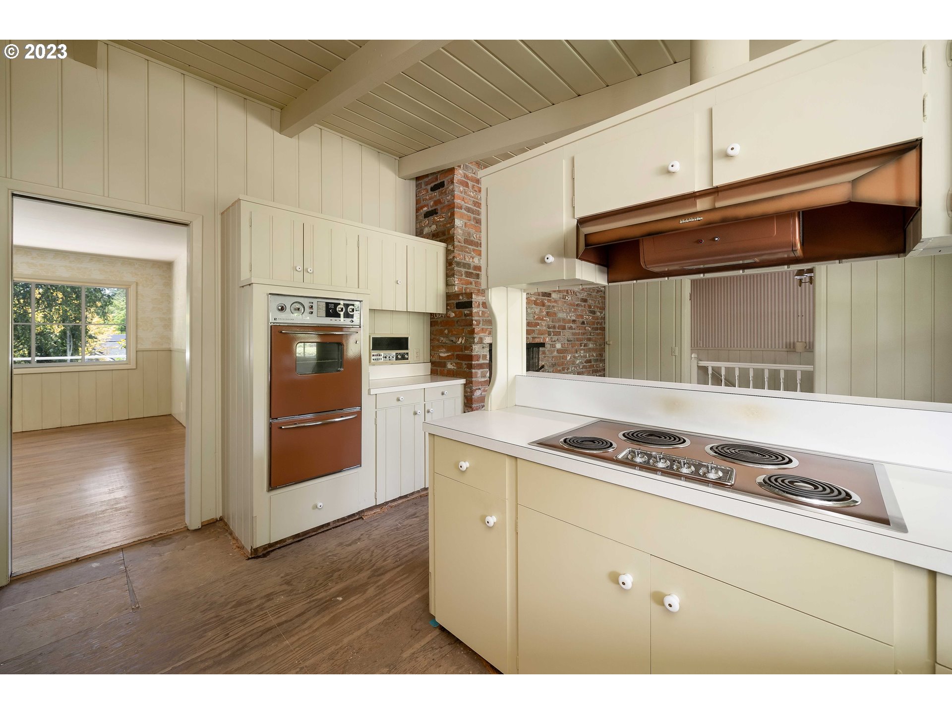 3815 Southwest 50th Avenue Portland, OR 97221 - Photo 7 of 36 a kitchen with stainless steel appliances granite countertop a stove and a refrigerator