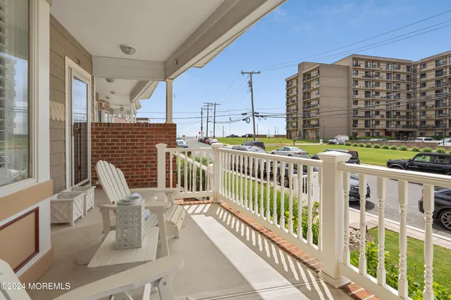 a view of balcony with furniture