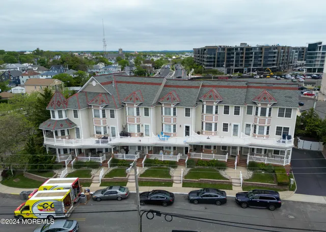 a view of a swimming pool with a roof deck