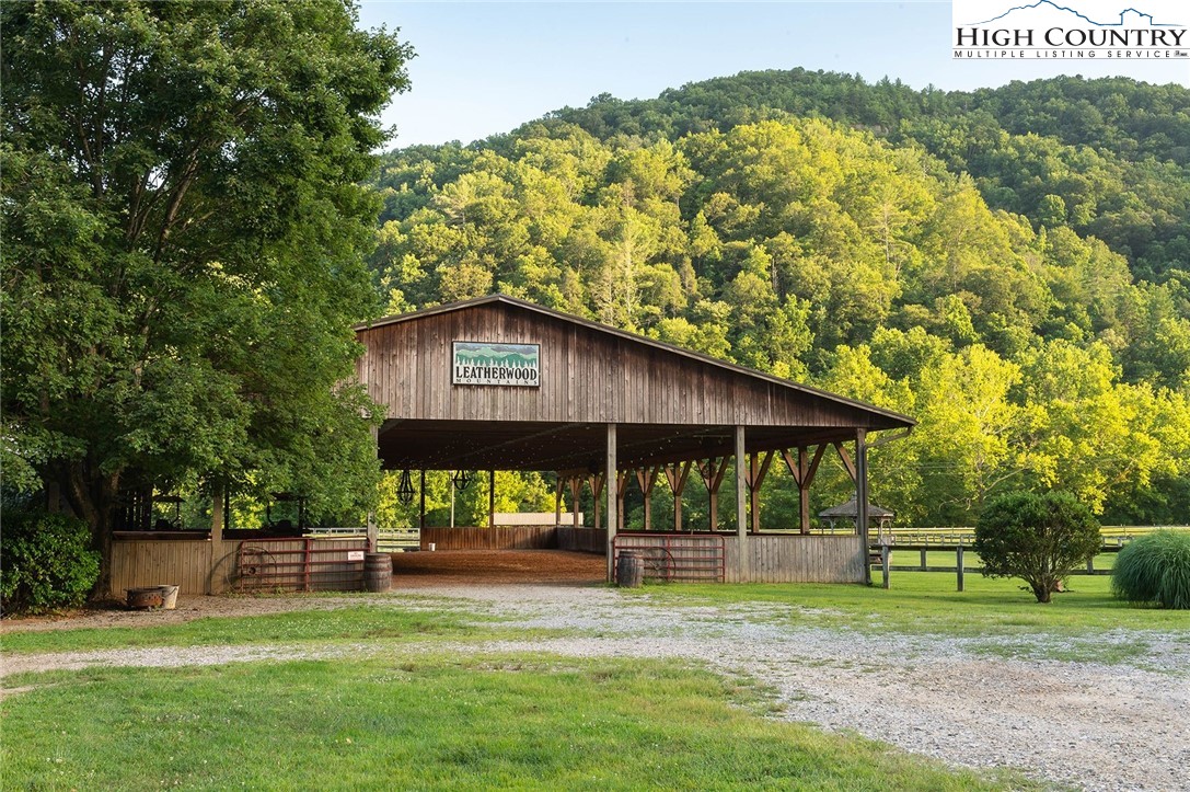 10 Cabin Ridge Road Ferguson, NC 28624 - Photo 3 of 12 a view of a house with a yard balcony and sitting area