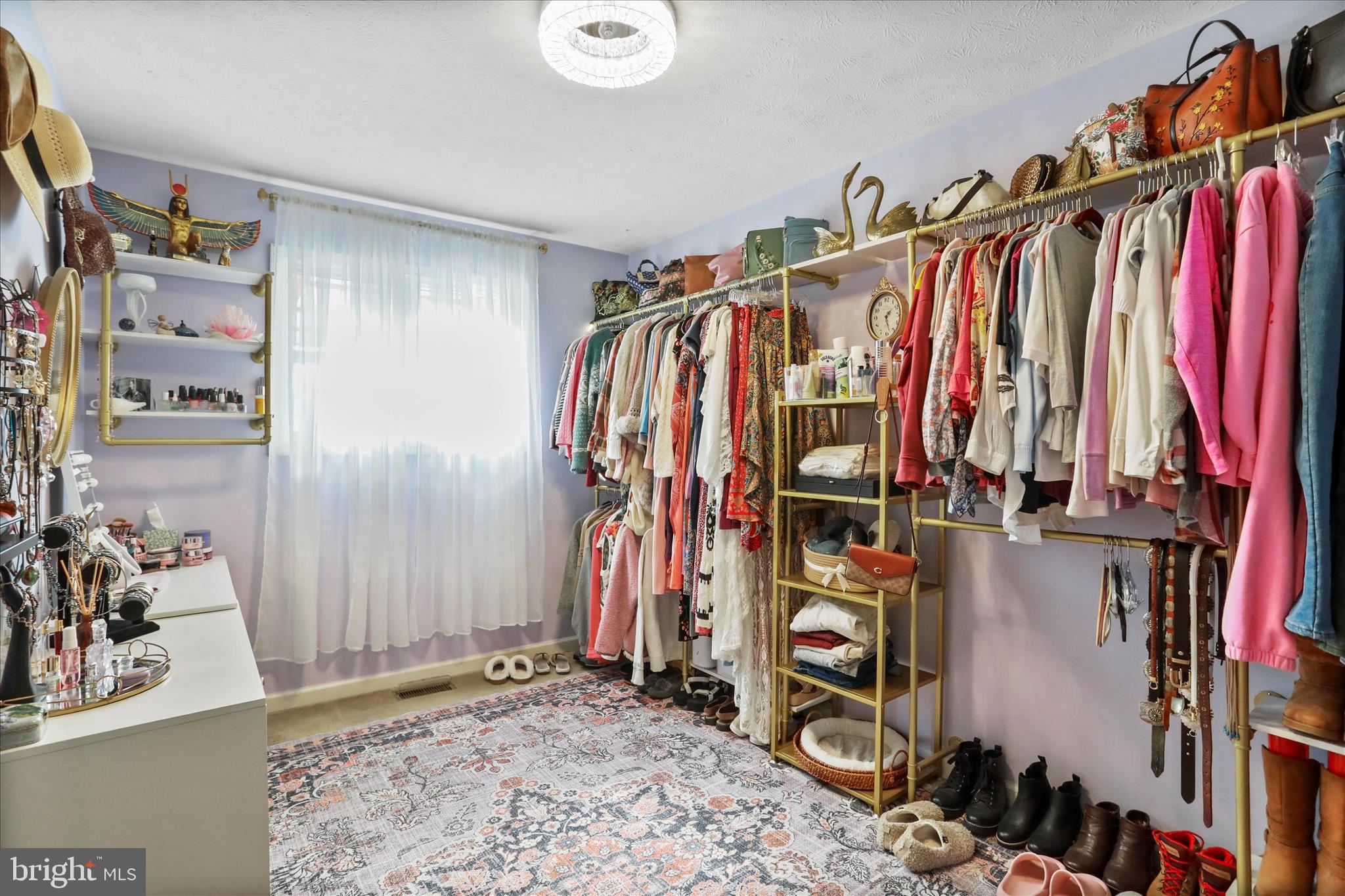 5670 Long Meadow Road Middletown, VA 22645 - Photo 18 of 61 a view of walk in closet with clothes