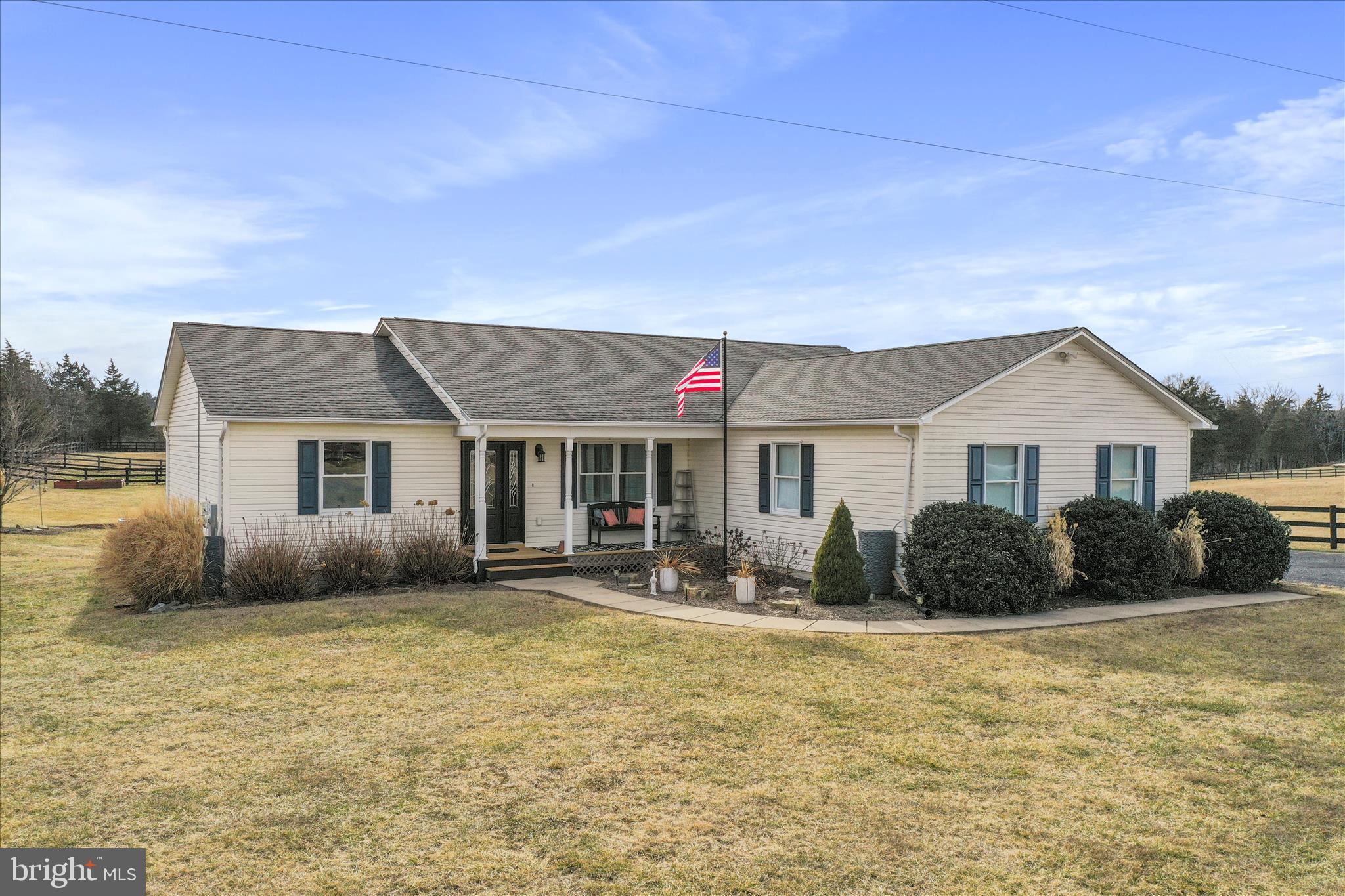 5670 Long Meadow Road Middletown, VA 22645 - Photo 2 of 61 a front view of a house with a yard
