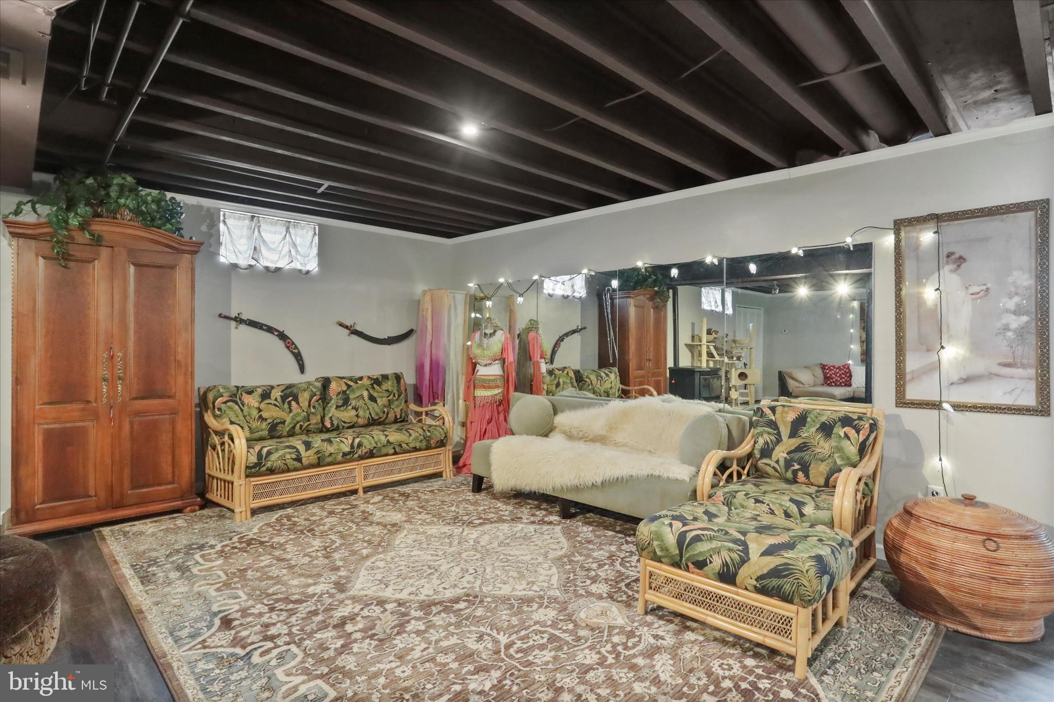 5670 Long Meadow Road Middletown, VA 22645 - Photo 34 of 61 a living room with furniture and wooden floors