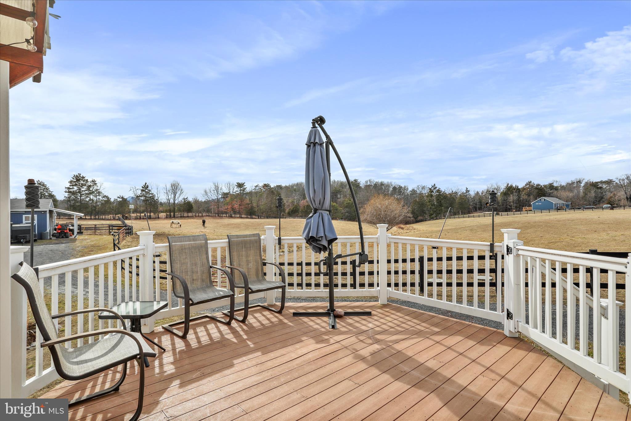 5670 Long Meadow Road Middletown, VA 22645 - Photo 39 of 61 a view of a chair and table on the terrace